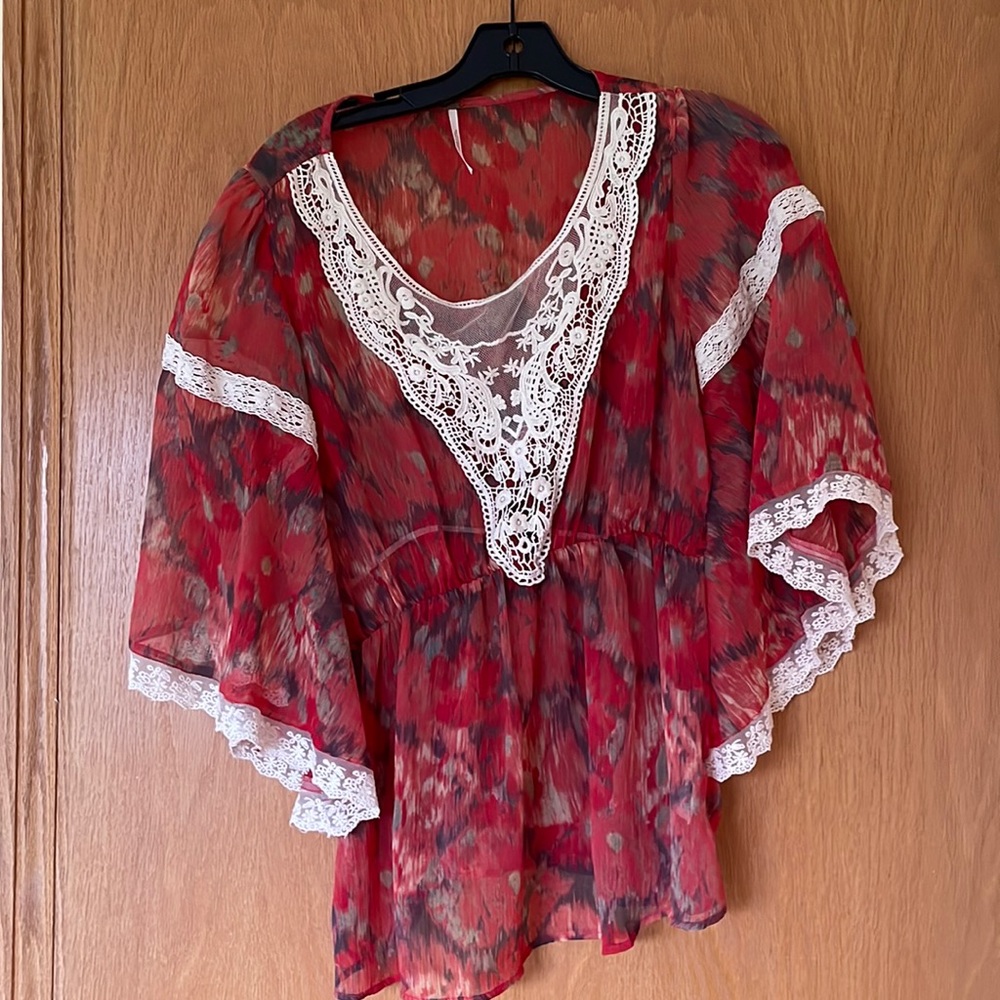 Like new, possibly not worn top.